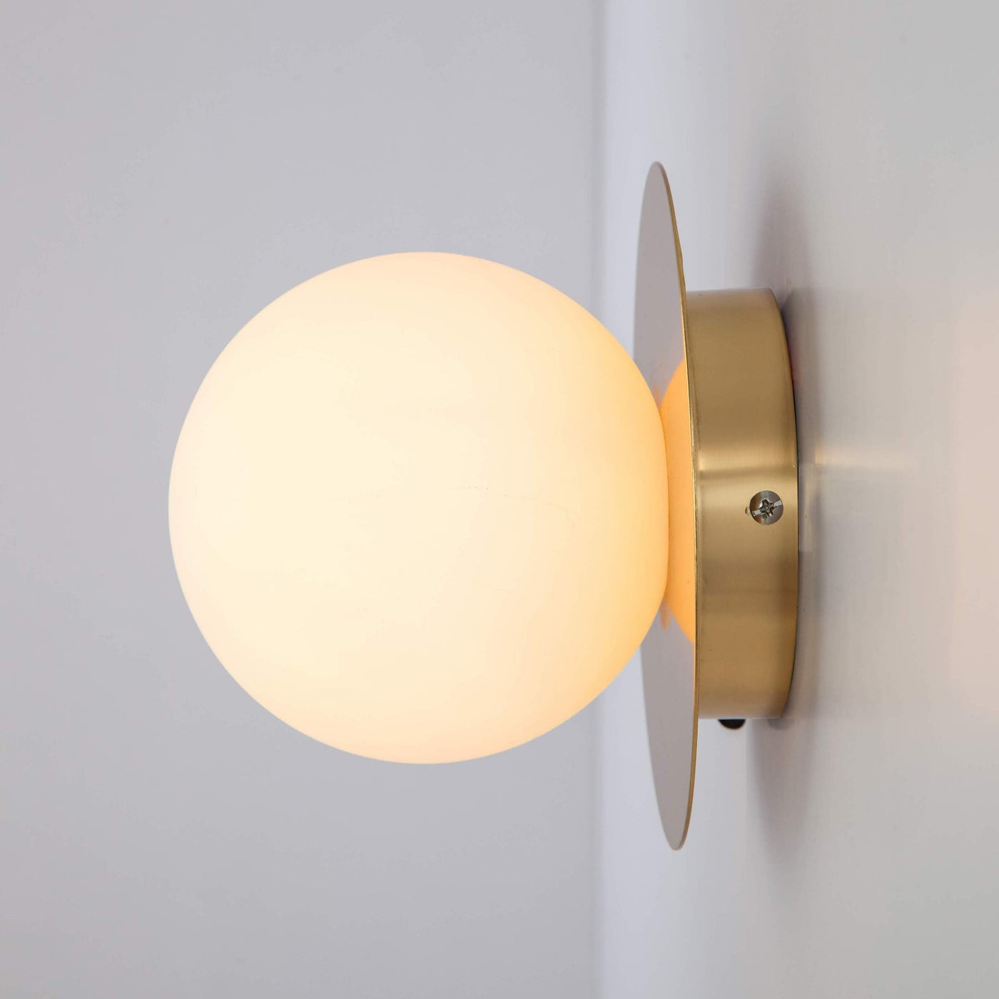 houseof opal disk wall light. British design at someday designs. #colour_brass