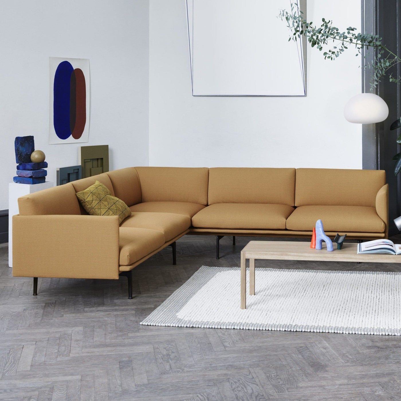 Muuto Outline Corner Sofa in cognac refine leather in a living room setting. Available made to order from someday designs. #colour_cognac-refine-leather