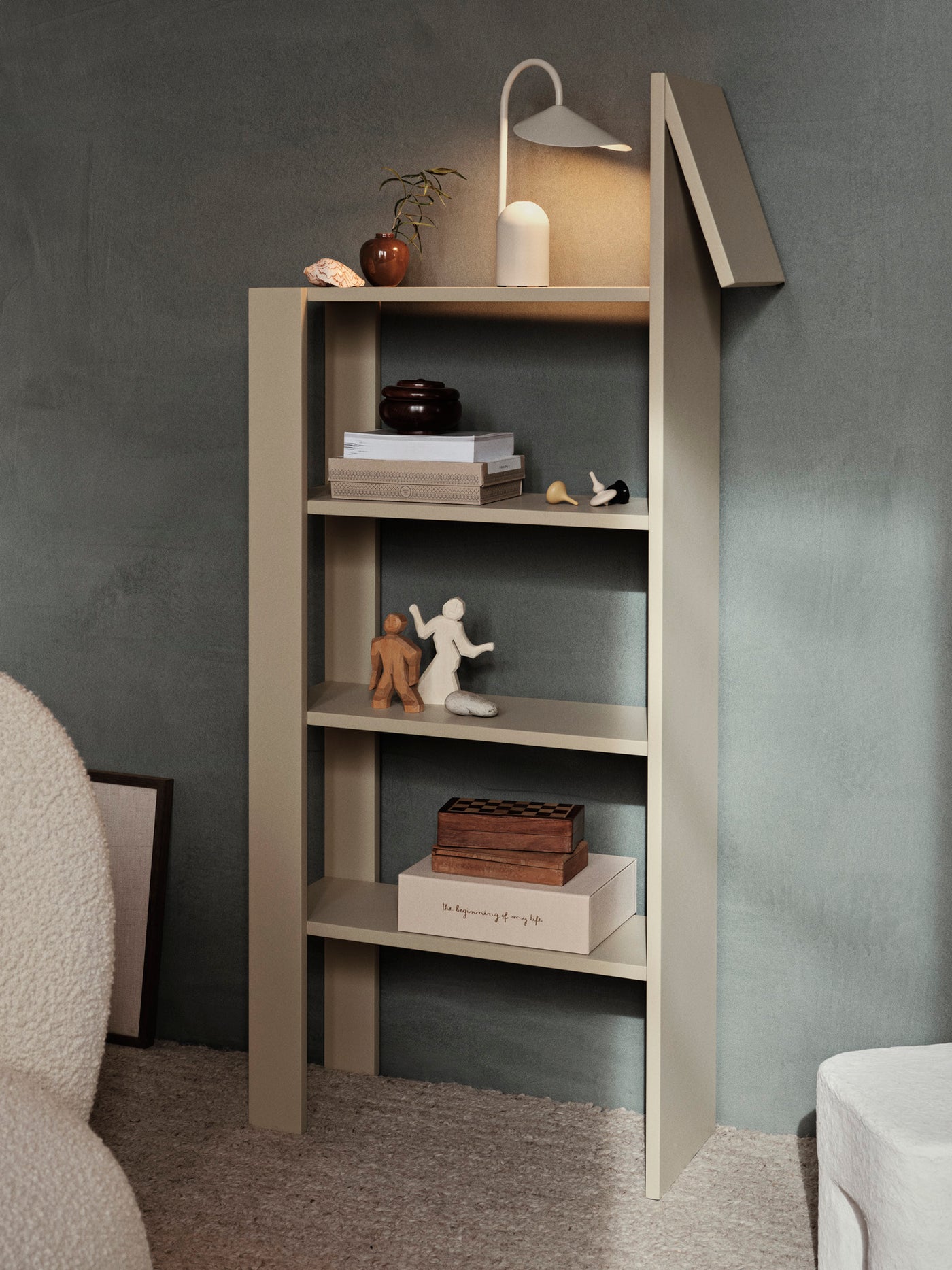 giraffe bookcase by ferm LIVING lifestyle with Arum Portable Lamp #colour_cashmere
