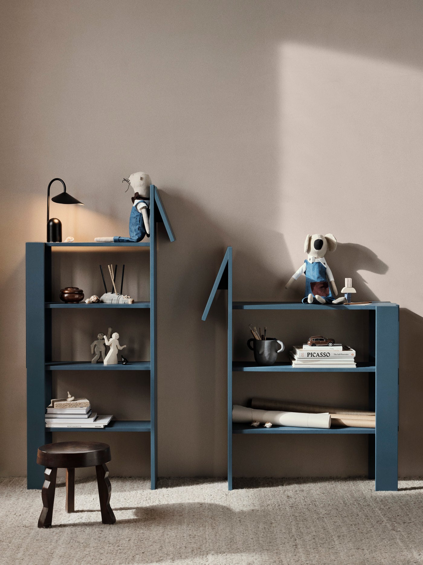 giraffe bookcase by ferm LIVING lifestyle image with horse bookcase #colour_dark-blue