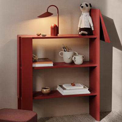 horse bookcase by ferm LIVING lifestyle image with arum portable lamp #colour_poppy-red