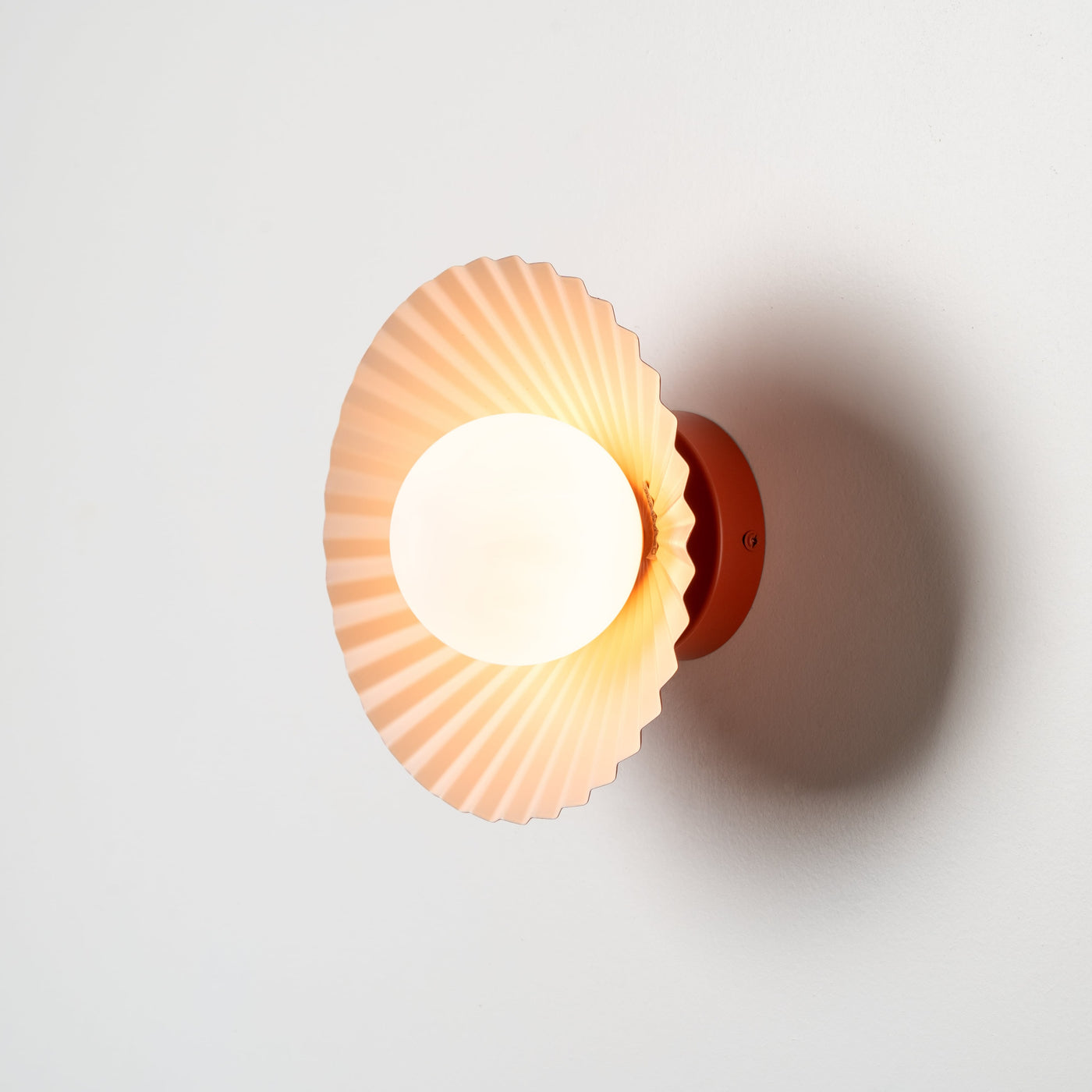 Houseof Pleat Wall and Flush Ceiling Lamp designed by Emma Gurner, light on. Available from someday designs.