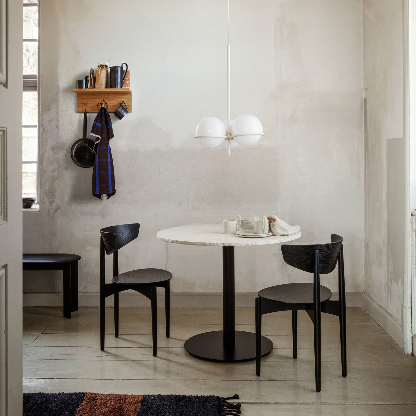 ferm LIVING Mineral Dining Table lifestyle. Free UK delivery at someday designs #colour_black