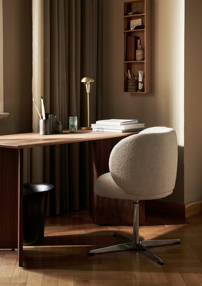 ferm LIVING Rico Dining Chair Swivel desk lifestyle. #colour_off-white-boucle