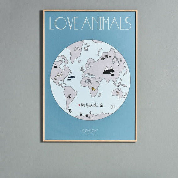 the love animals print by OYOY displayed on a grey wall above two Scandinavian designed cane chairs.