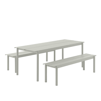 Muuto Linear Steel Outdoor Dining Set includes a large table and two benches with ample seating for 6-8 people. #colour_grey