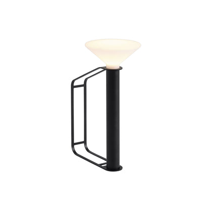 Muutos Piton Portable Lamp can provide direct as well as ambient lighting alongside the steel counterweight in its handle allowing for it to rest in a variety of positions. Free UK delivery at Someday Designs #colour_black
