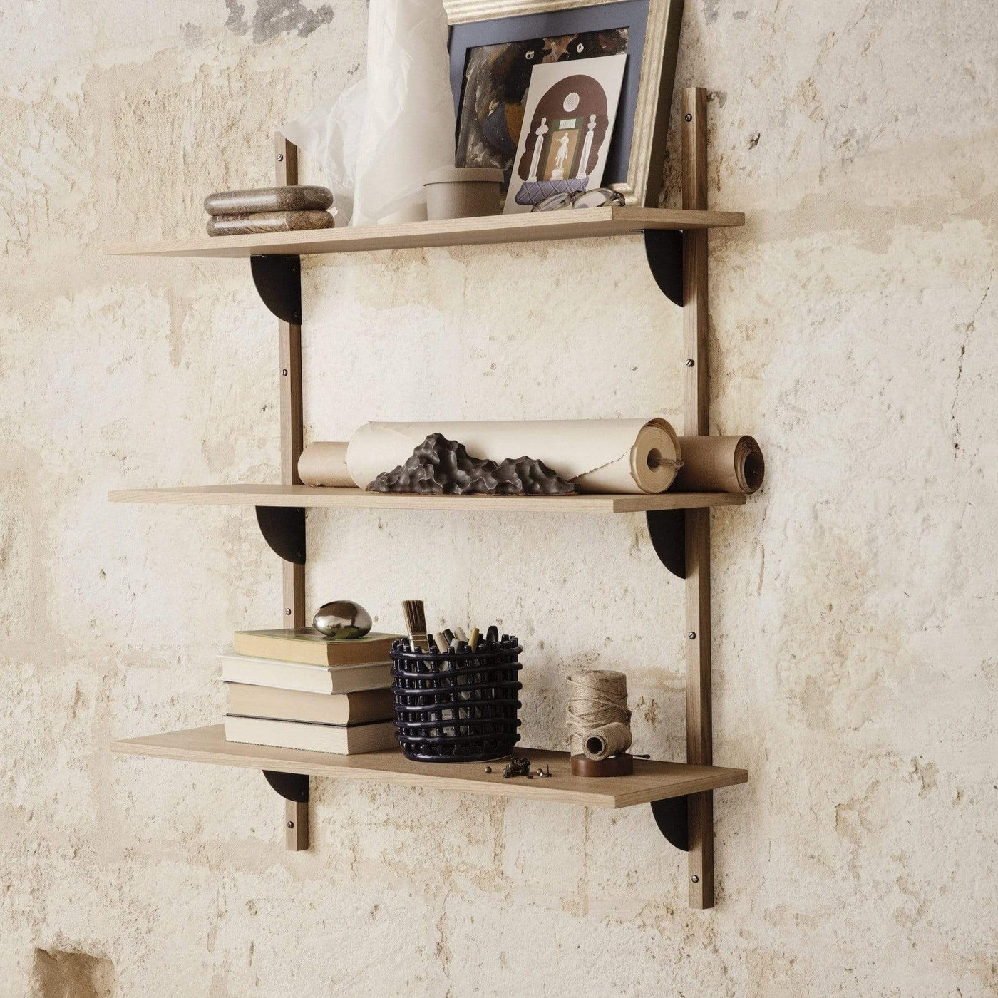 Ferm Living Sector Shelf triple wide in natural oak with blackened brass brackets. Available from someday designs 