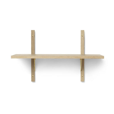 Ferm Living Sector shelf, single narrow in natural oak with polished brass brackets. Available from someday designs