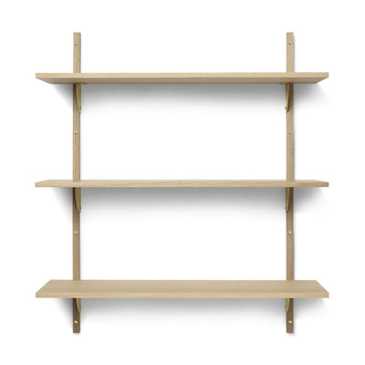 Ferm Living Sector Shelf triple wide in natural oak with polished brass brackets. Available from someday designs 