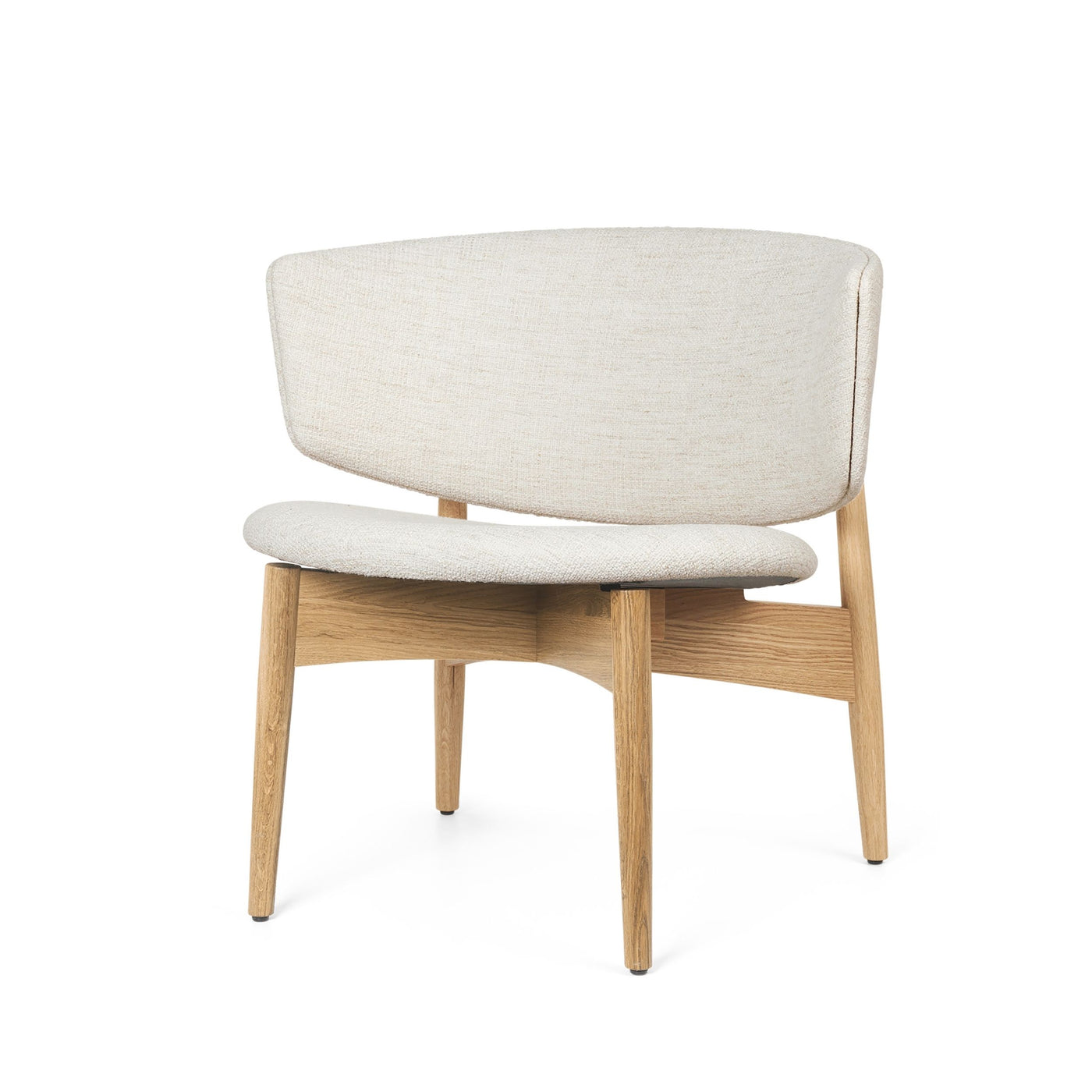 The Herman lounge chair is crafted from FSC™ Mix-certified wood and features a high-quality upholstery for added comfort. The low design features a generous base and a gently undulating backrest. Free UK delivery at Someday Designs #off-white-wool-boucle