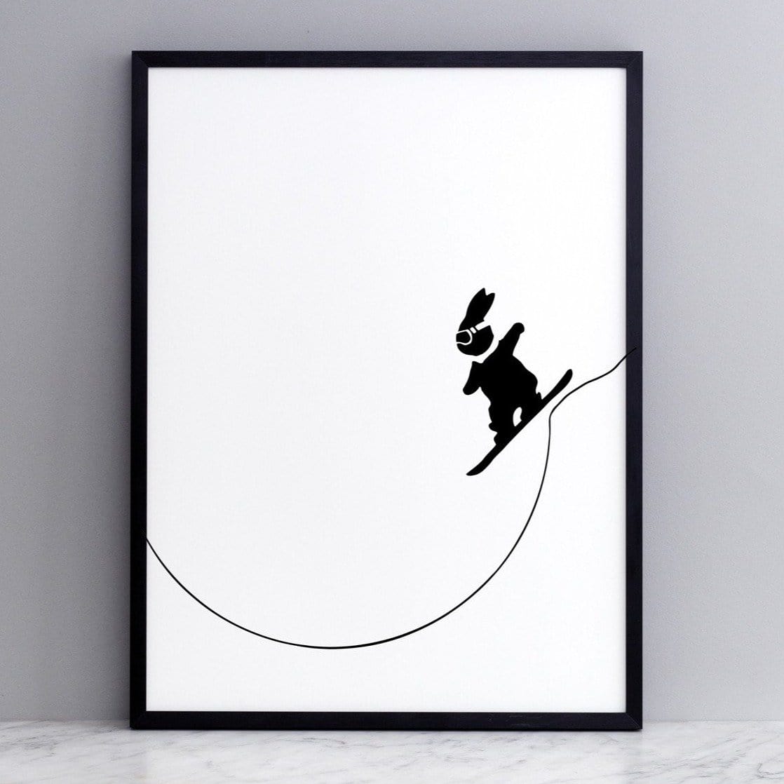 black and white image of HAM rabbit snowboarding off a slope.  Fun and playful series of prints.  Ideal for adults and children.