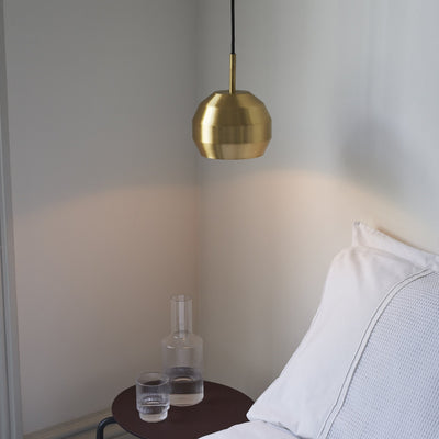 Vitamin Mini Pitch Pendant light in solid brushed brass finish as a bedside light. Available from someday designs. #colour_brass